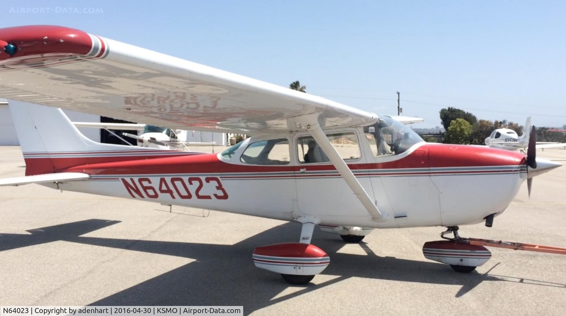 N64023, 1975 Cessna 172M C/N 17264969, N64023 at KSMO 04/30, being tugged to fuel pump.