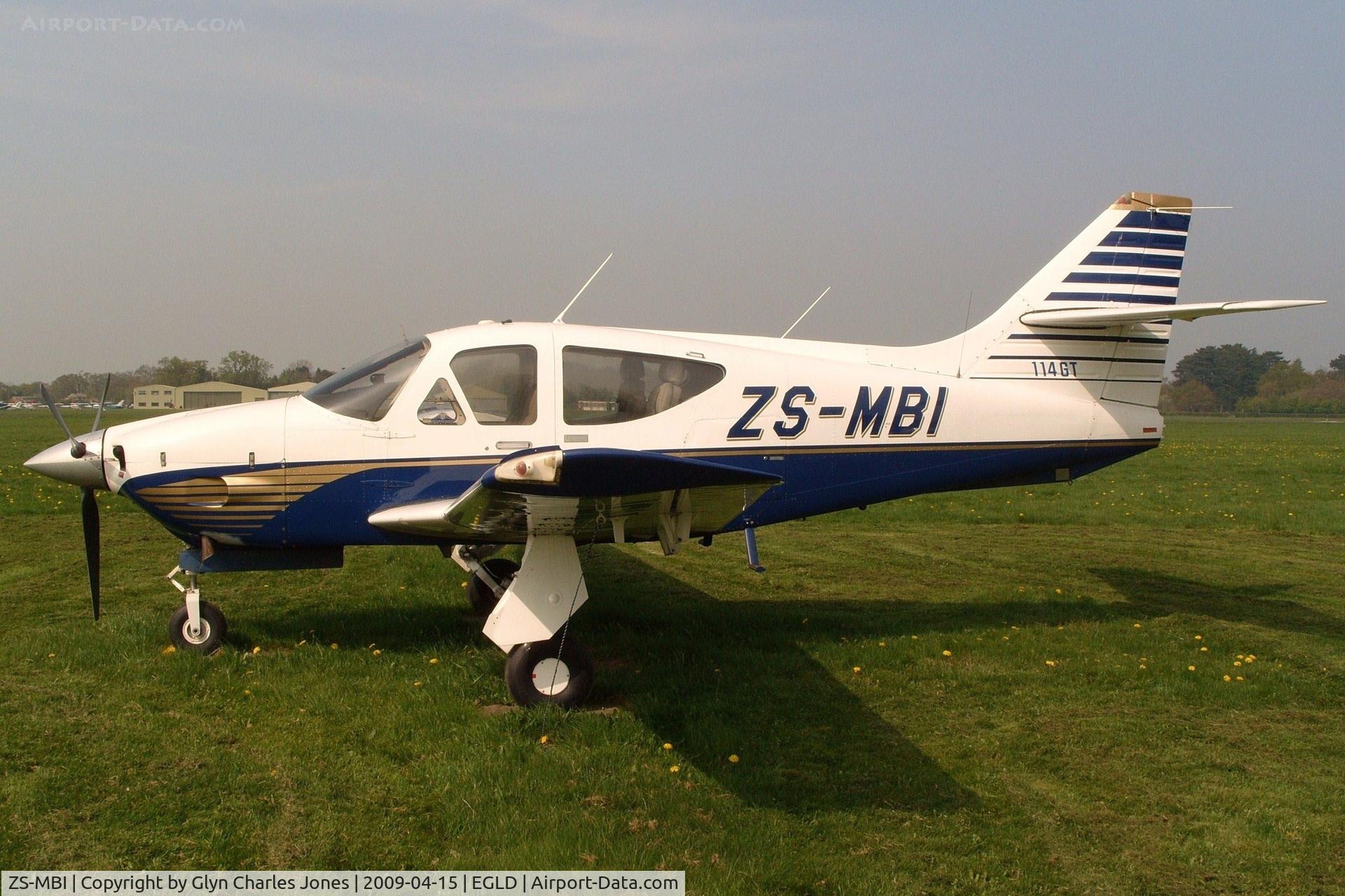 ZS-MBI, 1978 Rockwell Commander 114GT C/N 14361, Good to see this visitor from South Africa back at Denham again. With thanks to the control tower who granted me authority to take photographs on this part of the aerodrome. Re-registered to N136D on 29th July 2009.