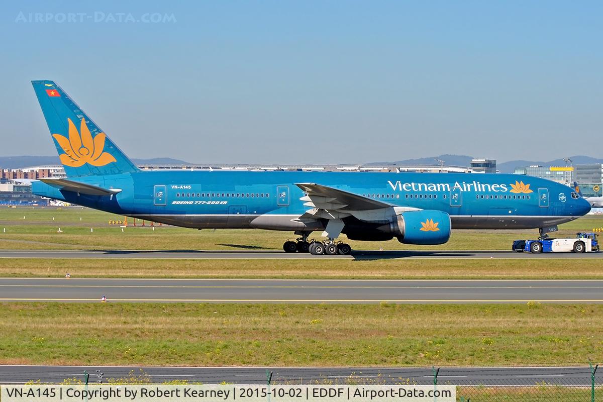 VN-A146, 2004 Boeing 777-26KER C/N 33504, On tow around to stand