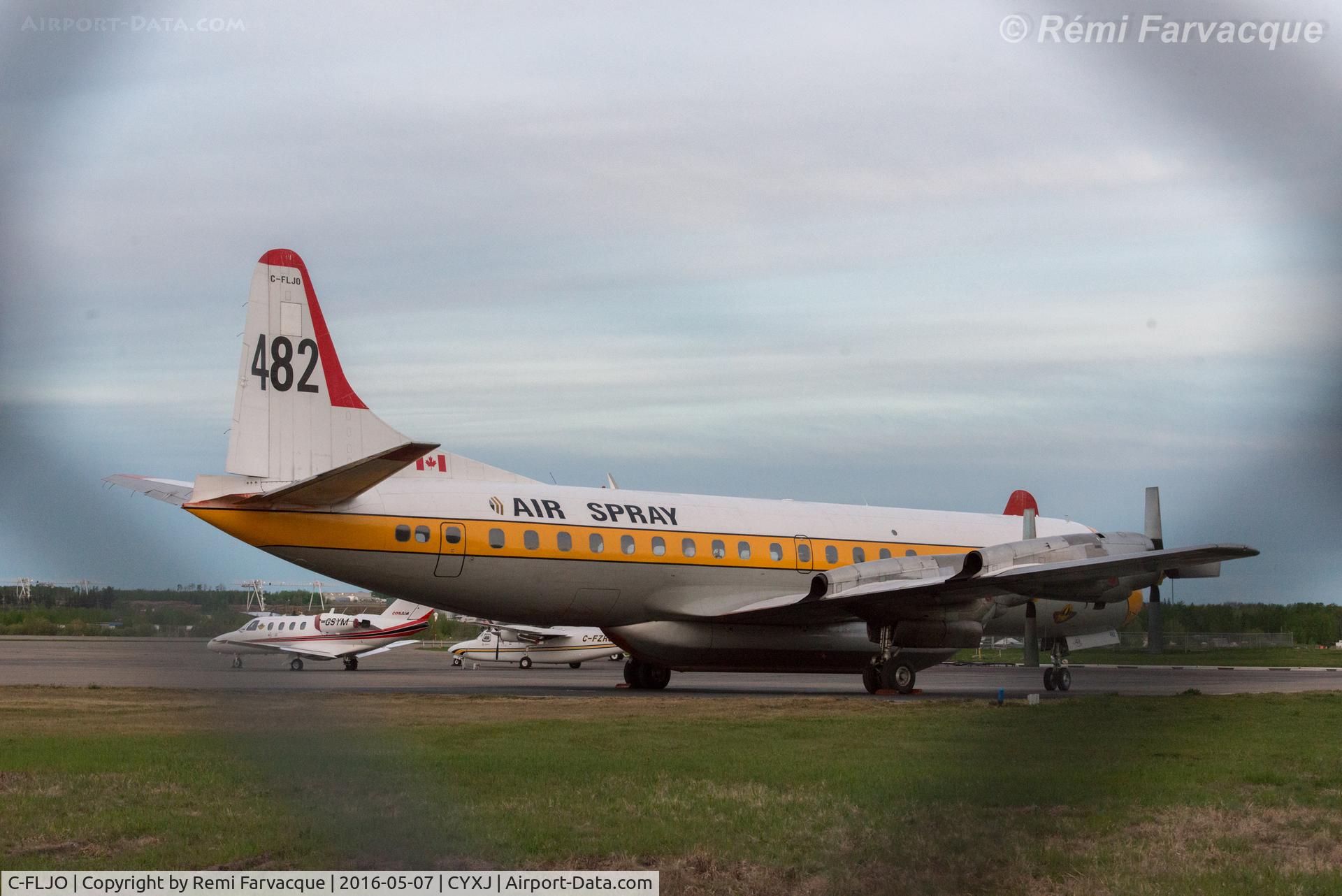 C-FLJO, Lockheed L-188C Electra C/N 1103, Parked north of control tower with other crsft involved in fighting the Beatton River and Siphon fires.
