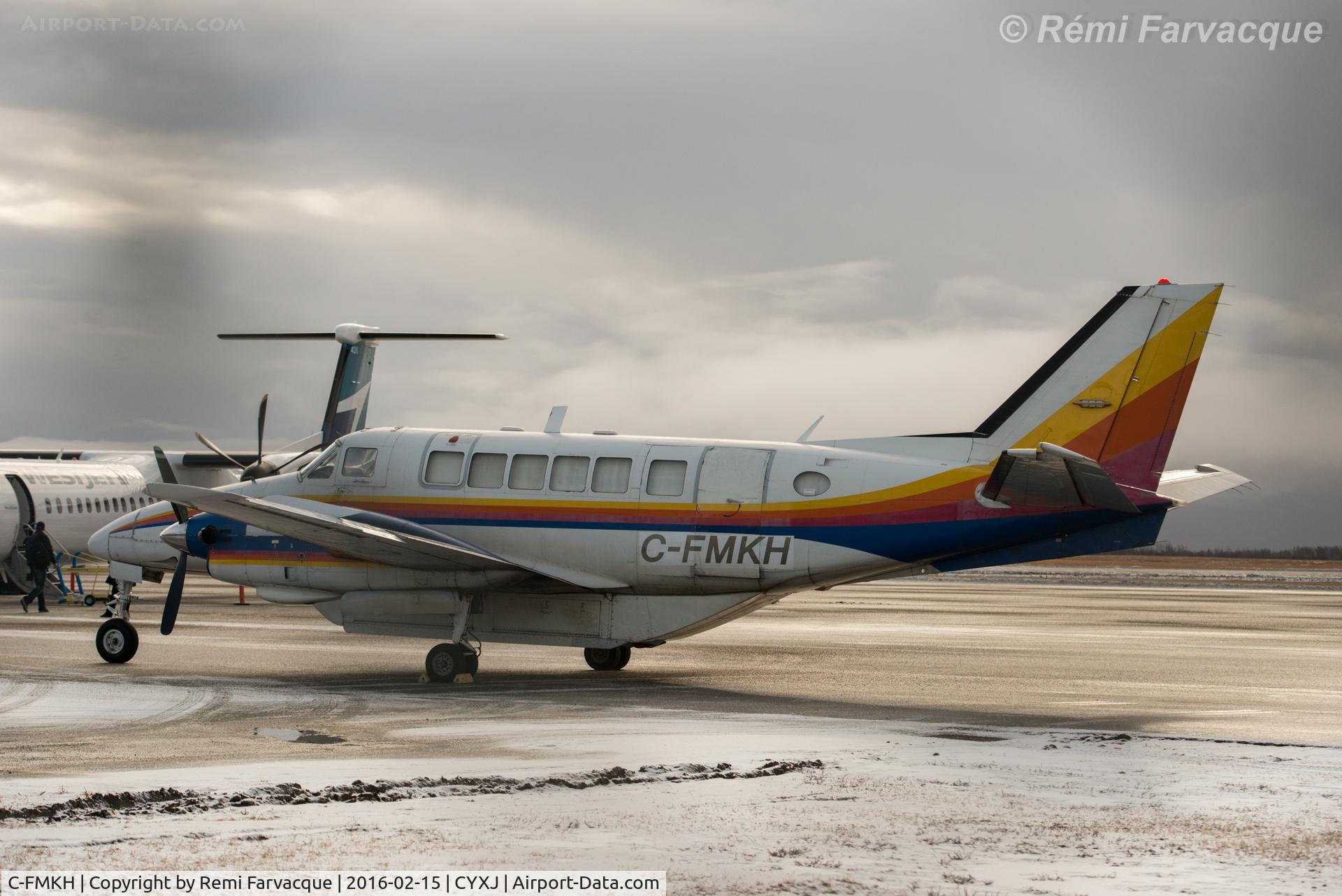 C-FMKH, 1968 Beech 99 C/N U-12, Parked between main terminal and control tower.