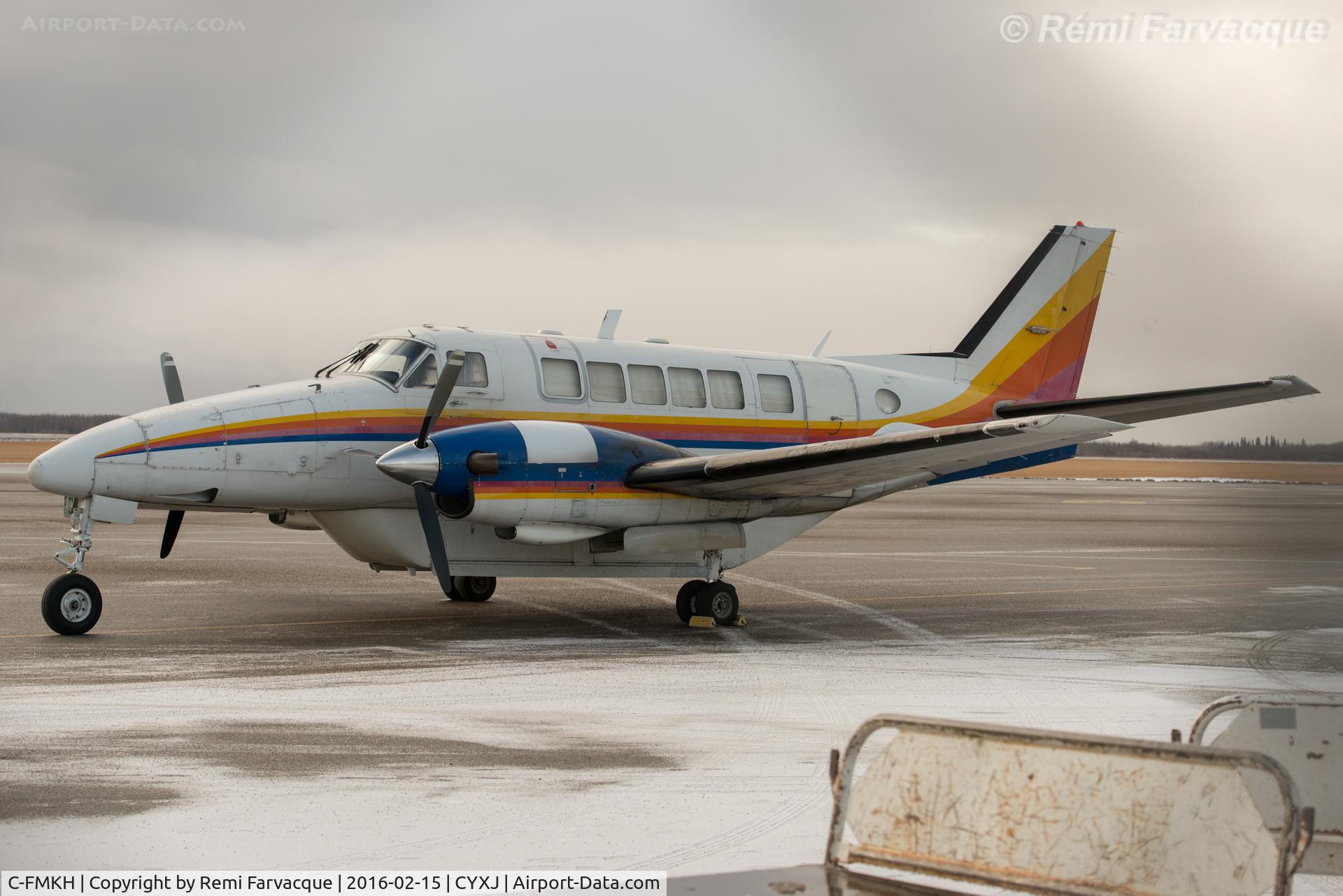 C-FMKH, 1968 Beech 99 C/N U-12, Parked between main terminal and control tower.