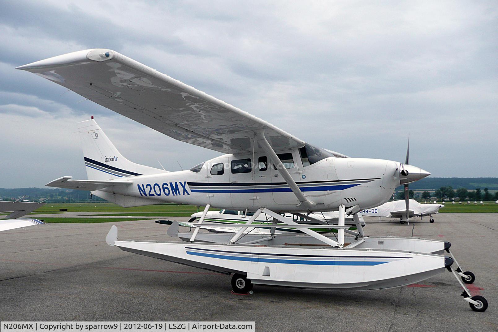 N206MX, 2001 Cessna 206H Stationair C/N 20608149, On hard ground at Grenchen, customs airport.
