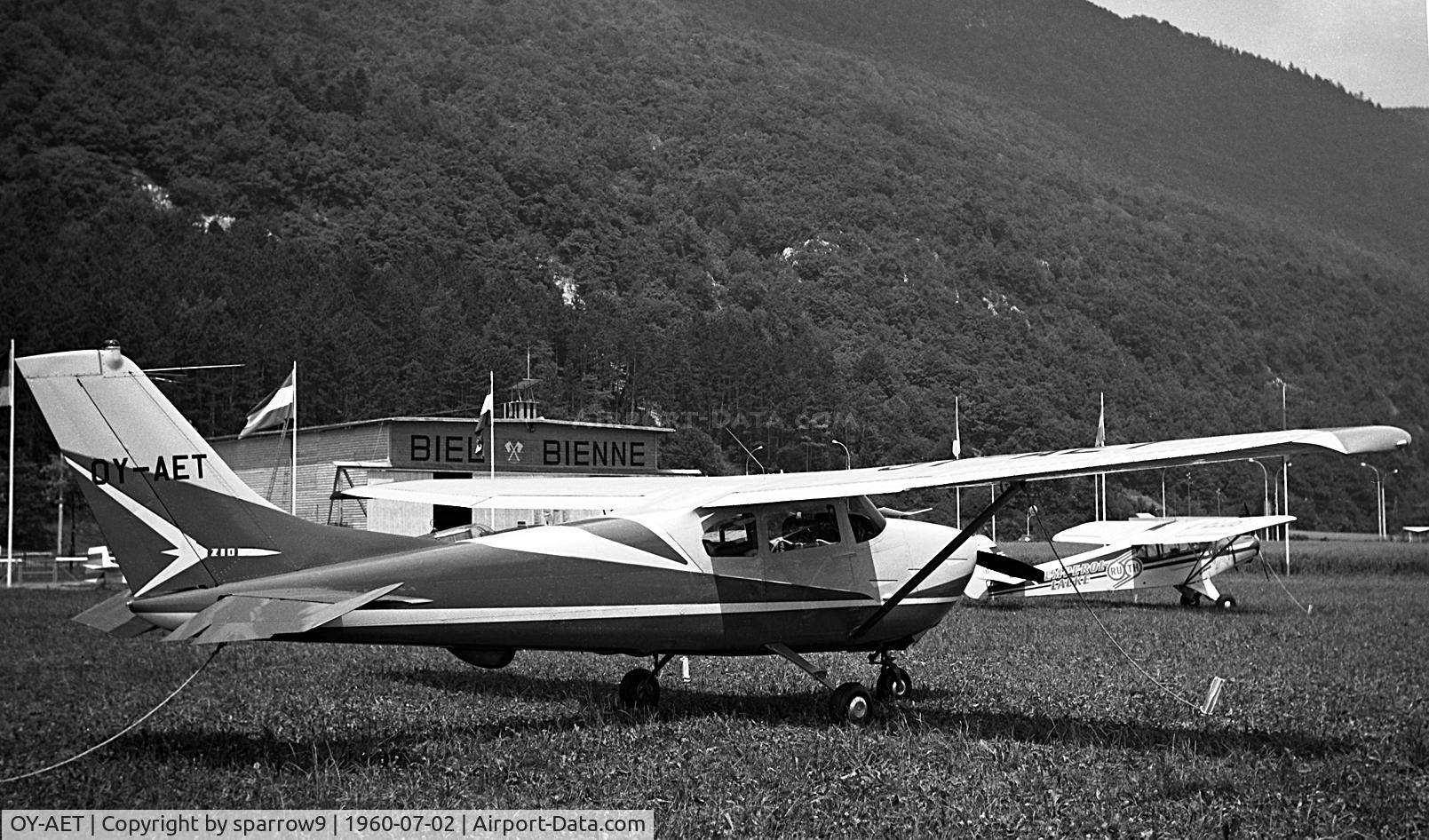 OY-AET, 1960 Cessna 210 C/N 57195, Seen at Biel-Boezingen airfield(closed 1963) during Rally de la Montre 1960