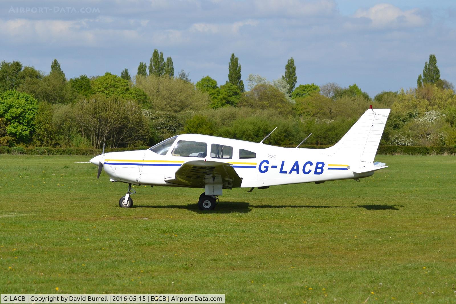 G-LACB, 1982 Piper PA-28-161 Cherokee C/N 28-8216035, Piper Cherokee at Manchester City Airport.