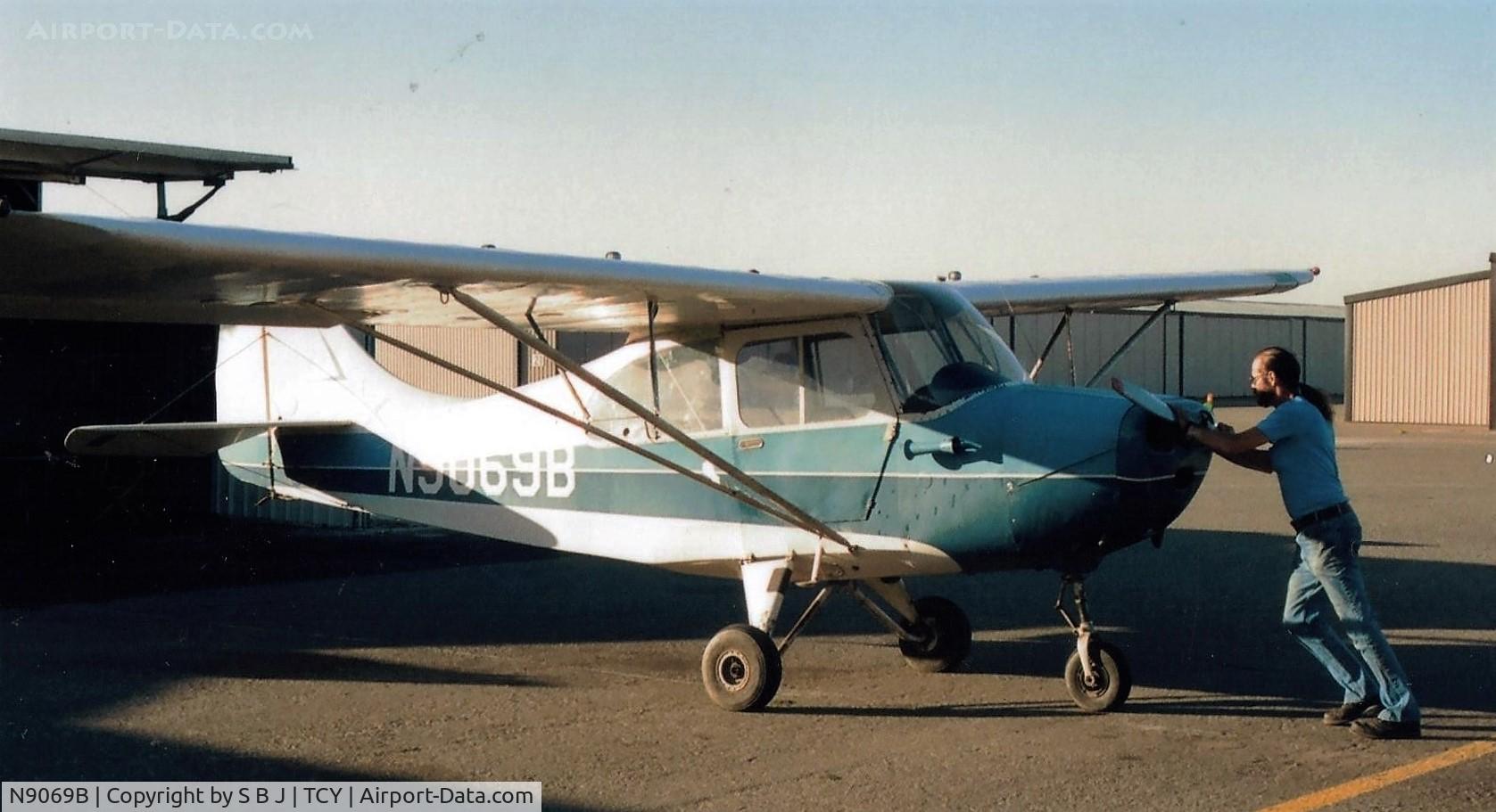 N9069B, 1958 Champion 7FC C/N 7FC-153, 69B being put into its new hangar after purchase and before rebuilding.