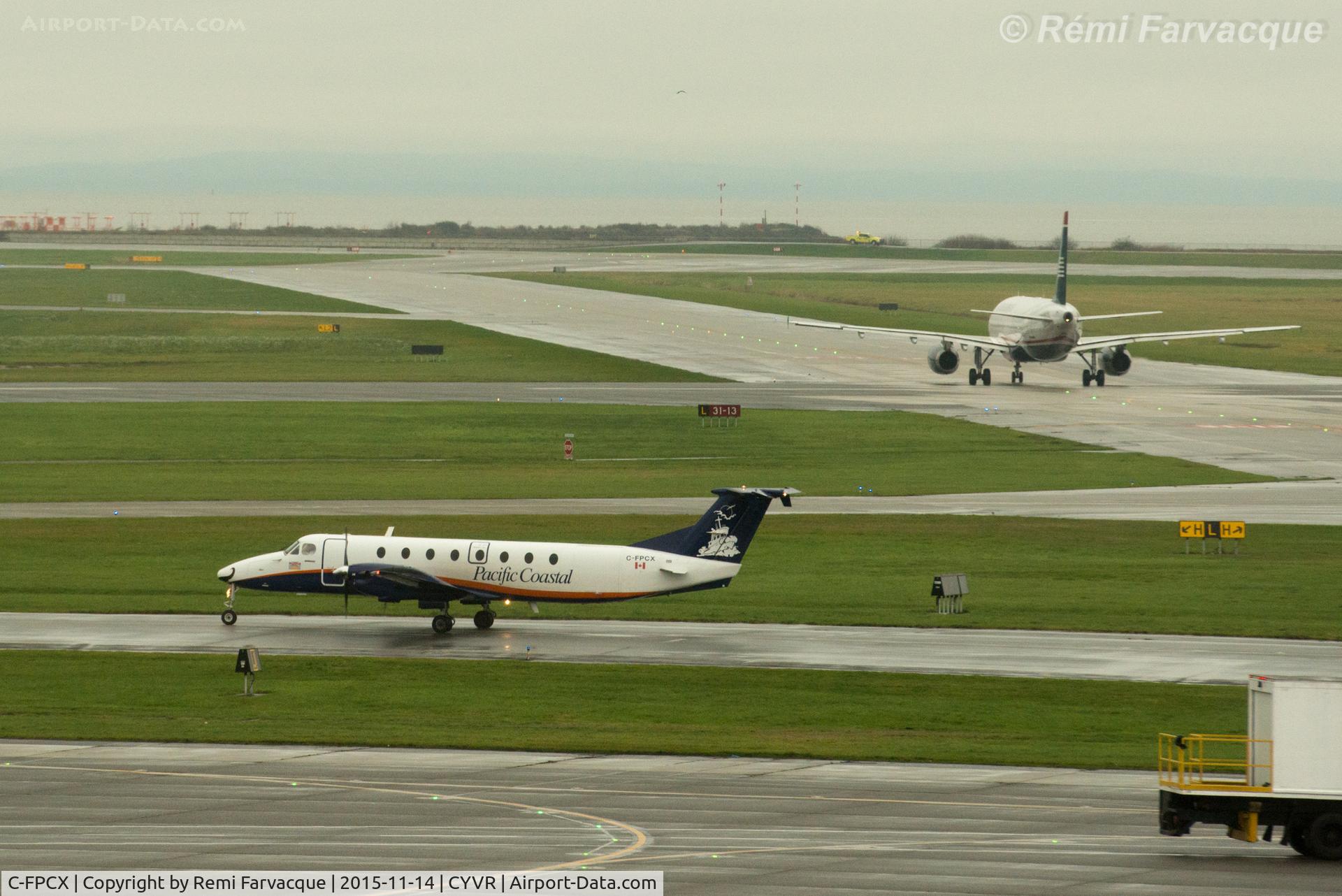 C-FPCX, 1986 Beech 1900C C/N UB-66, Taxiing to domestic terminal