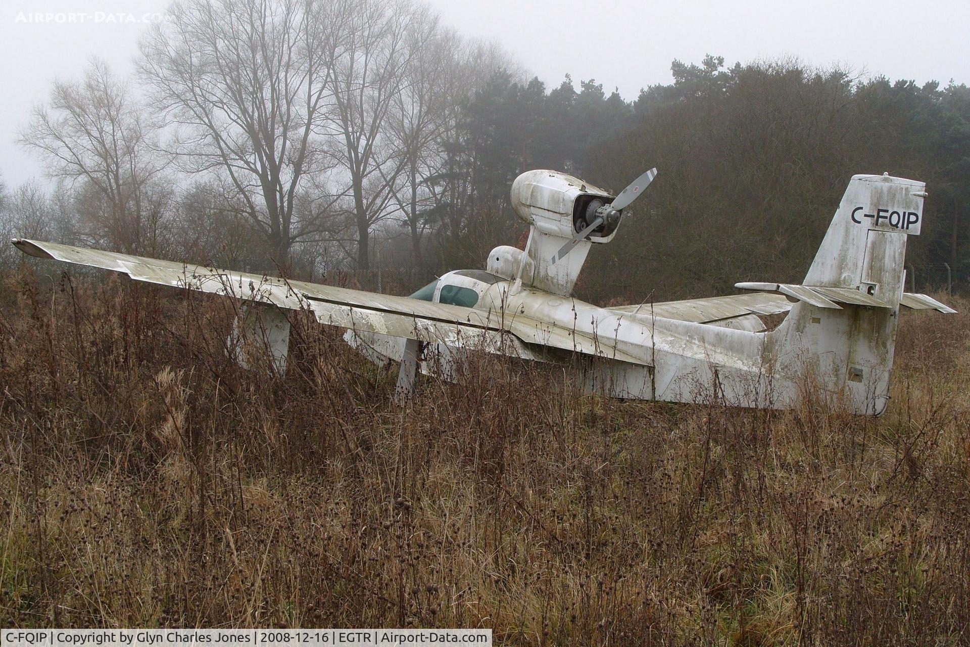 C-FQIP, 1975 Lake LA-4-200 Buccaneer C/N 679, Taken on a quiet cold and foggy day. Sadly looking rather shabby after being exposed to the elements for a very long period of time and is gradually being engulfed by the plant life around it.