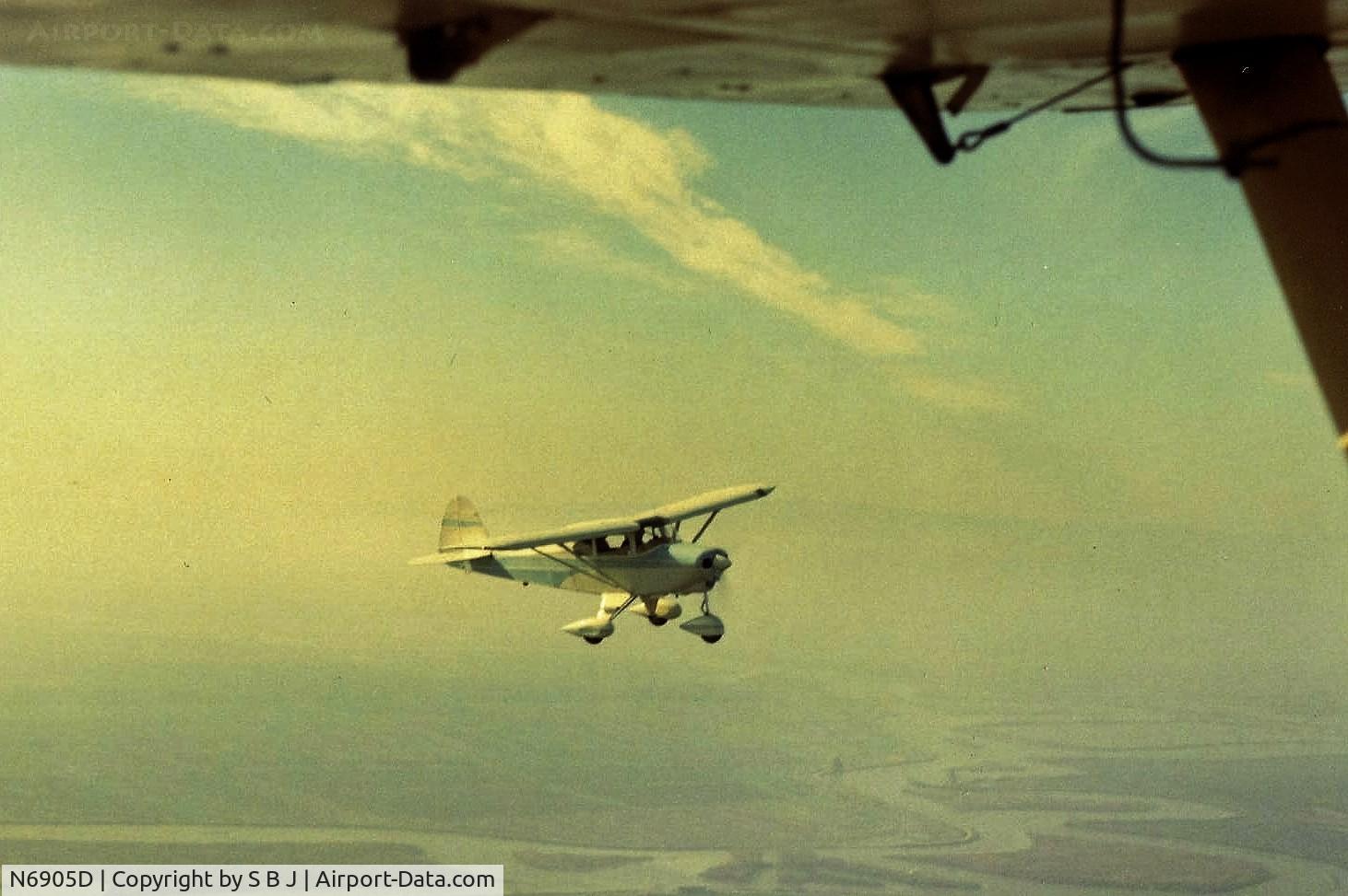 N6905D, 1957 Piper PA-22-150 Tri-Pacer C/N 22-4832, 05D over the Sacramento delta on a flight to Davis, Calif.