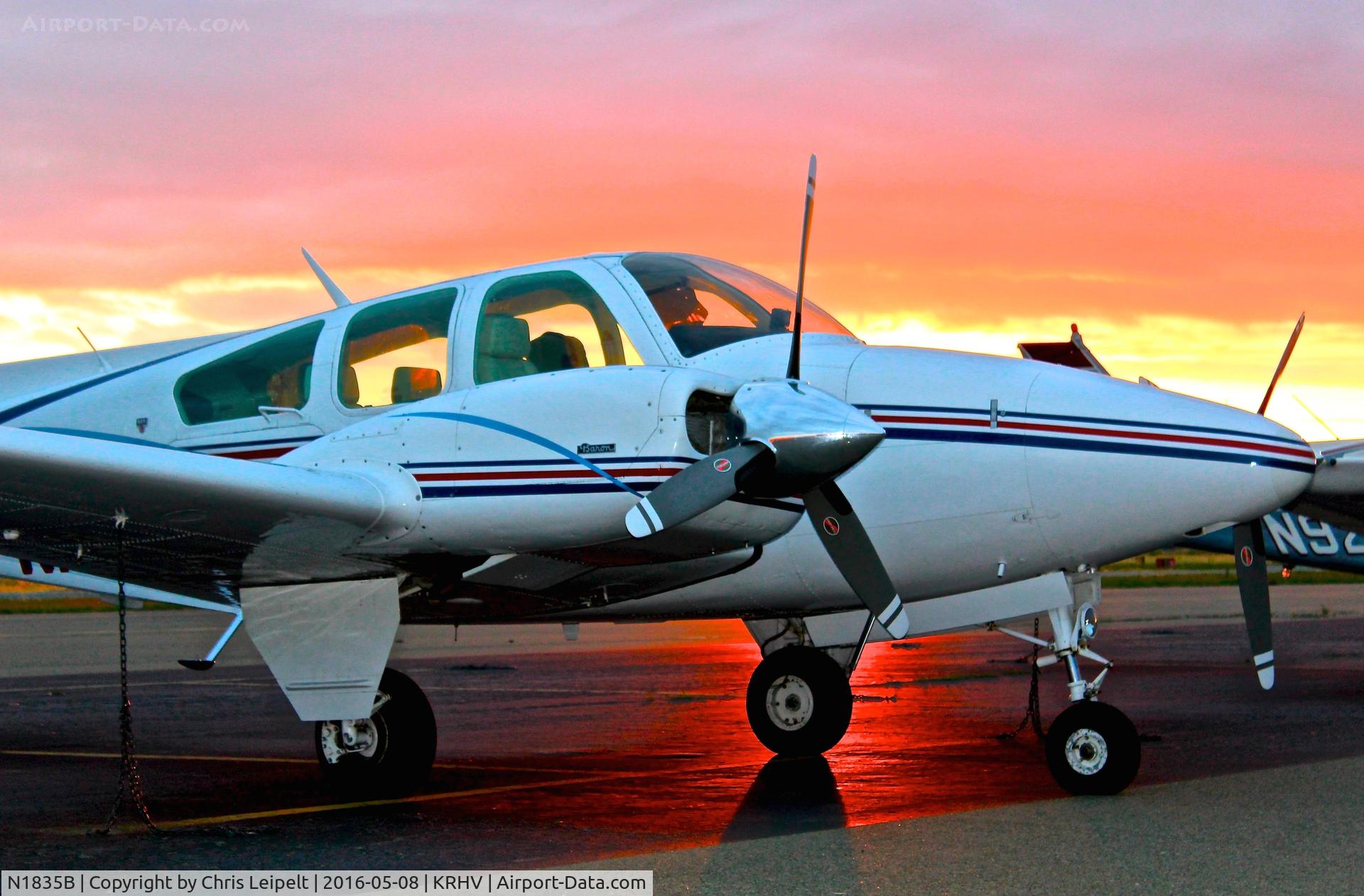 N1835B, 1977 Beech 95-B55 (T42A) Baron C/N TC-2076, California-based 1977 Beechcraft Baron 55 parked on the transient ramp during sunset at Reid Hillview Airport, San Jose, CA.