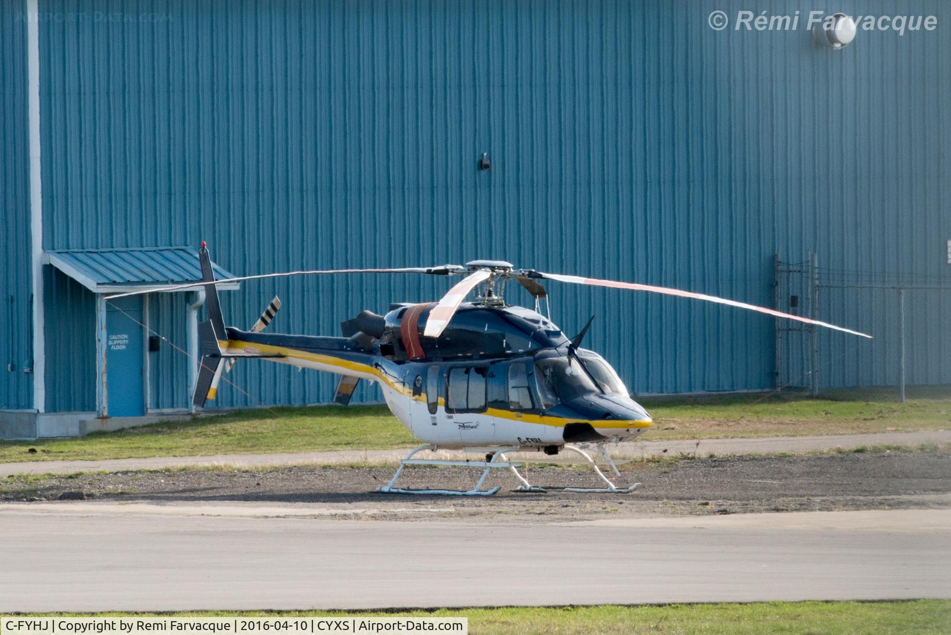 C-FYHJ, Bell 206B JetRanger III C/N 2900, Parked south of main terminal