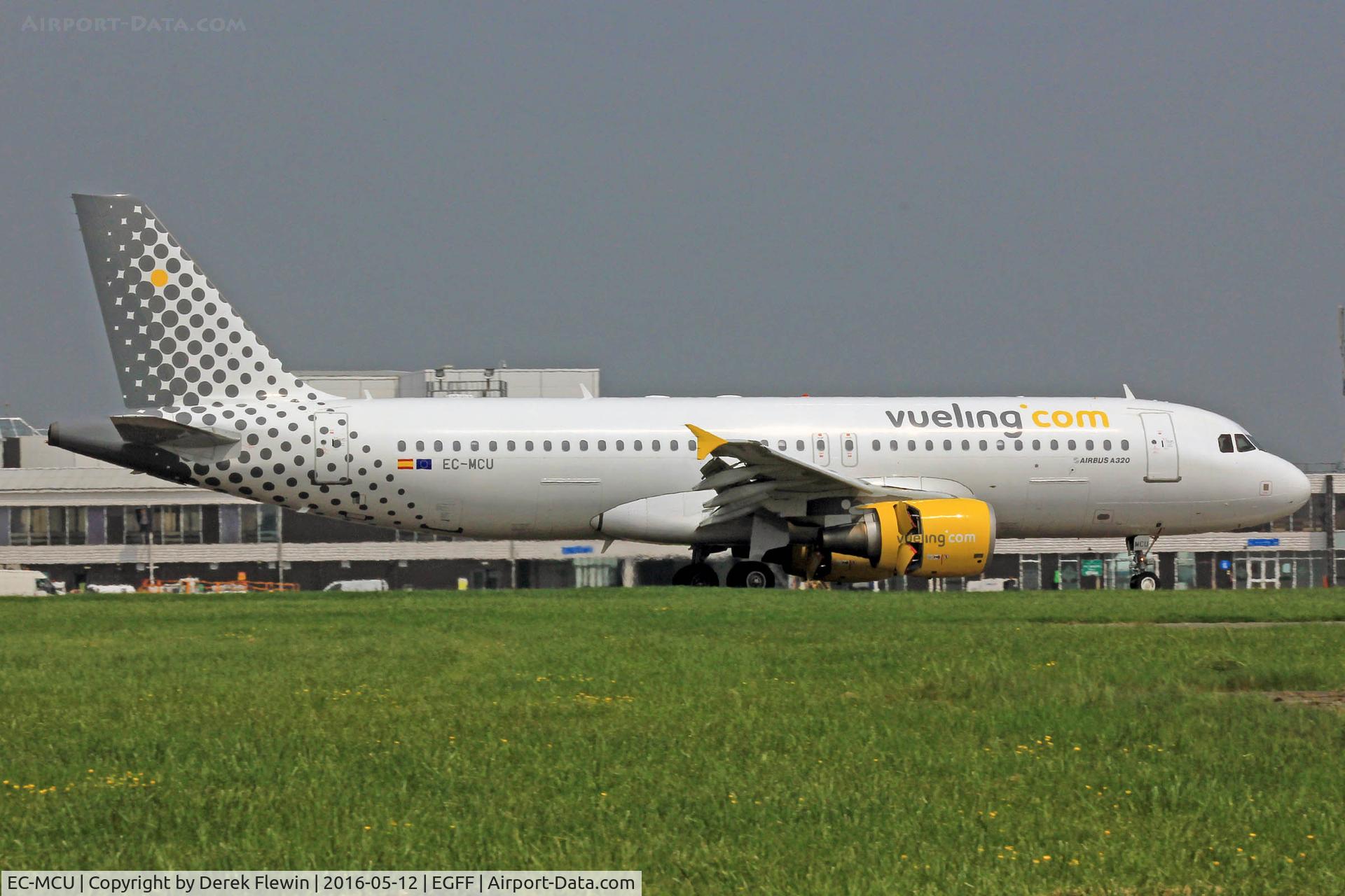 EC-MCU, 2009 Airbus A320-214 C/N 3907, A320-214, callsign Vueling 12AV, previously D-AVVA, 9K-EAC, EL-ERX, A6-RKB, EI-ERX, arriving on runway 12 out of Alicante,  note the open reverse thruster doors.