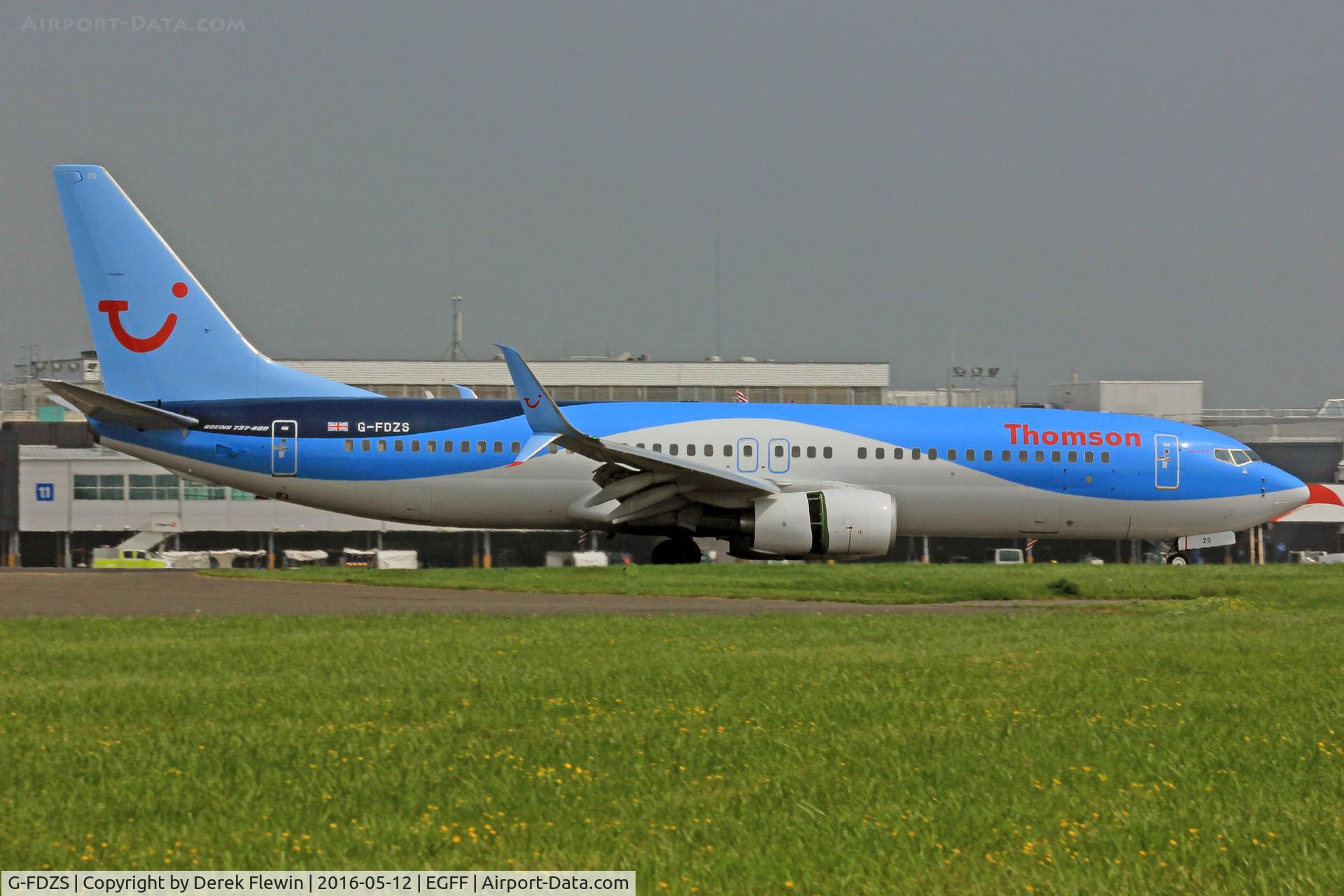 G-FDZS, 2009 Boeing 737-8K5 C/N 35147, 737-8K5, Thomson Airways, call sign Thomson 1CT, previously N1786B, seen landing on runway 12 out of Faro,  note the open reverse thruster doors. See also is the, Scimitar Winglet System which lowers drag by 2%, better c02 emissions, payload and duration.