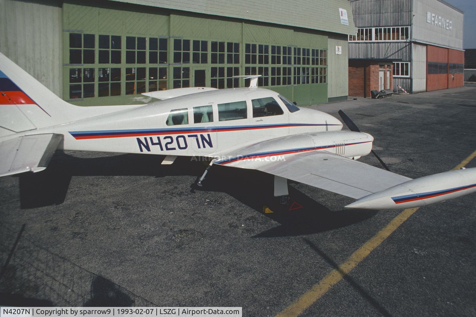 N4207N, 1964 Cessna 320B Skyknight C/N 320B0047, In front of maintenance-hangar