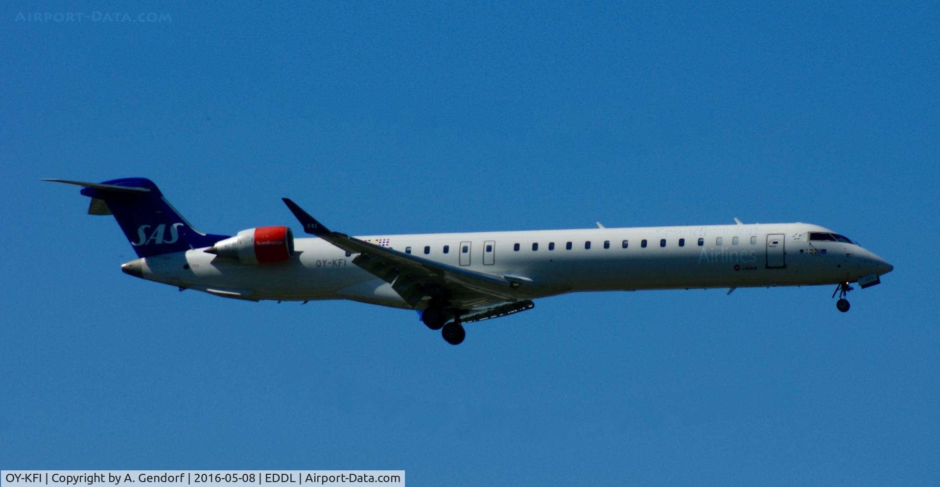 OY-KFI, 2009 Canadair CRJ-900ER (CL-600-2D24) C/N 15242, SAS, is here on short final RWY 05R at Düsseldorf Int'l(EDDL)