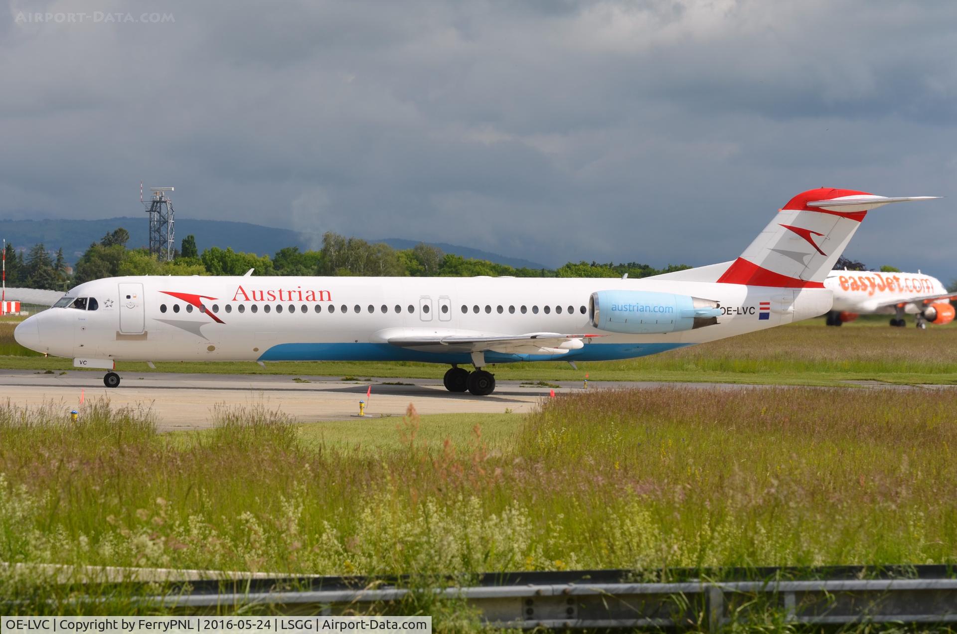 OE-LVC, 1993 Fokker 100 (F-28-0100) C/N 11446, Austrian Fk100 holding short of runway in GVA
