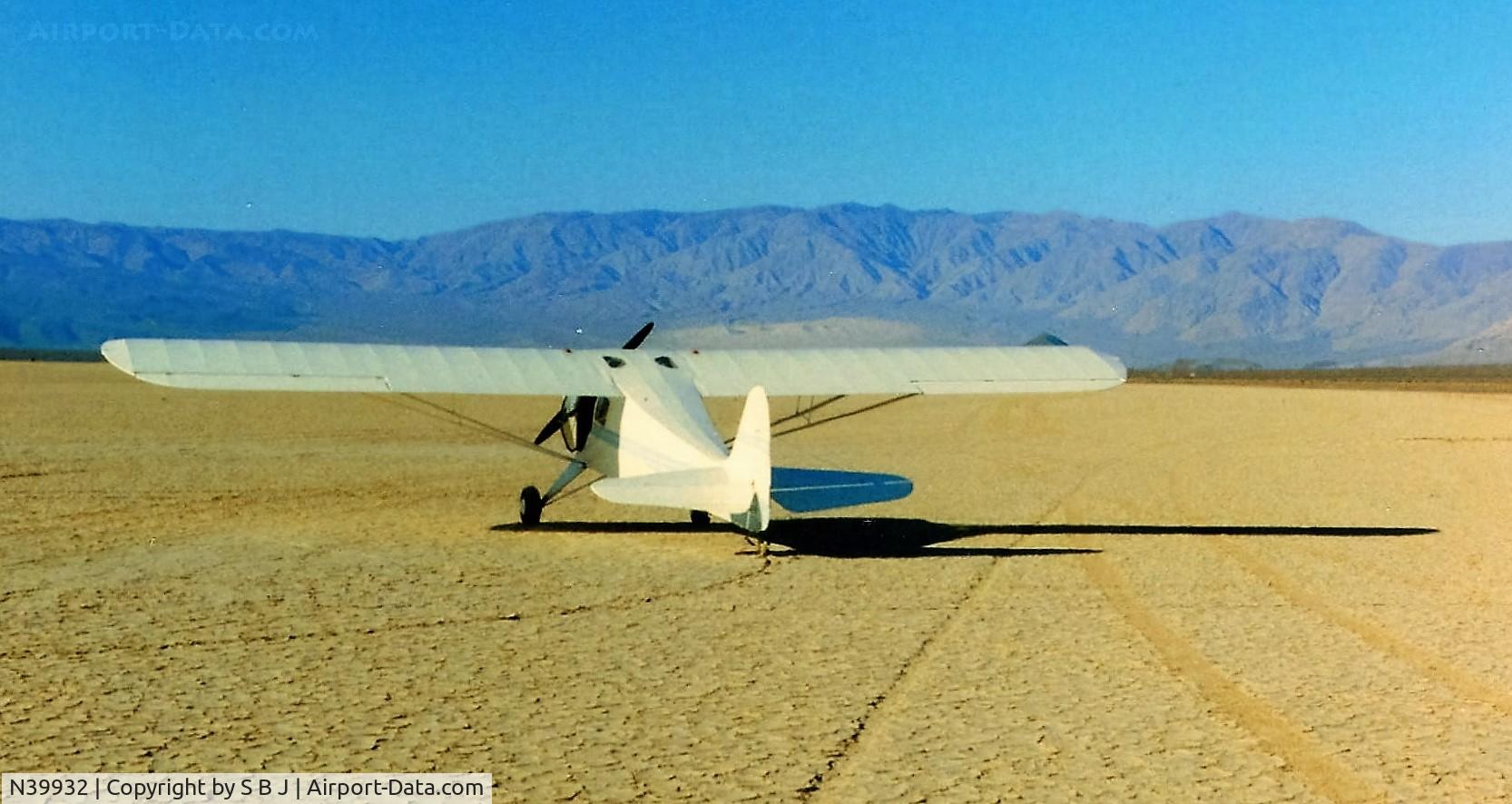 N39932, 1945 Taylorcraft BC12-D C/N 6585, 932 on Panamint dry lake before it became part of Death Valley and vehicles were then not allowed on lake. Notice sand dunes above 932.Regardless of the many high winds, they never change their location. View is north.