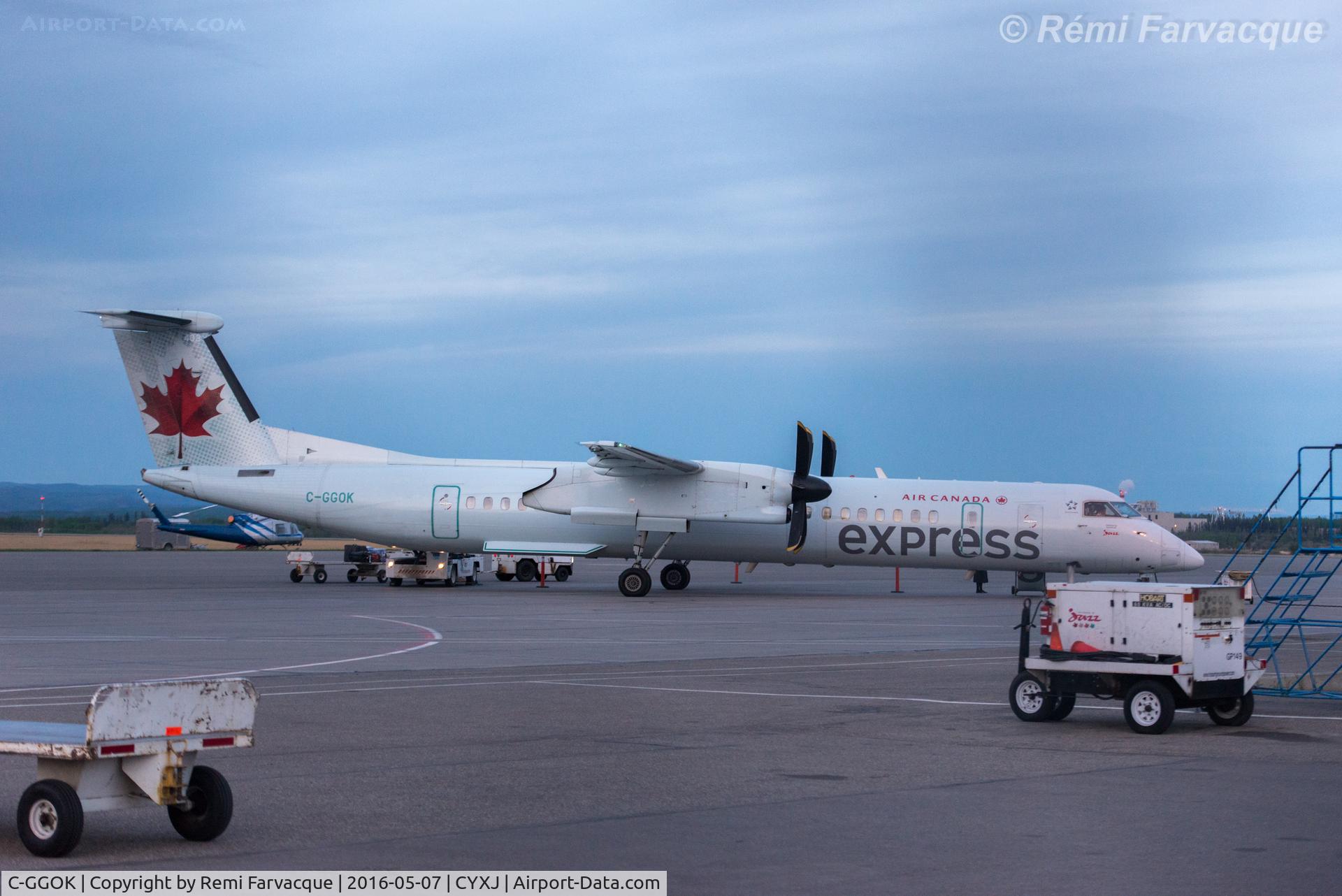 C-GGOK, 2011 De Havilland Canada DHC-8-402Q Dash 8 C/N 4372, Freshly arrived in  front of main terminal