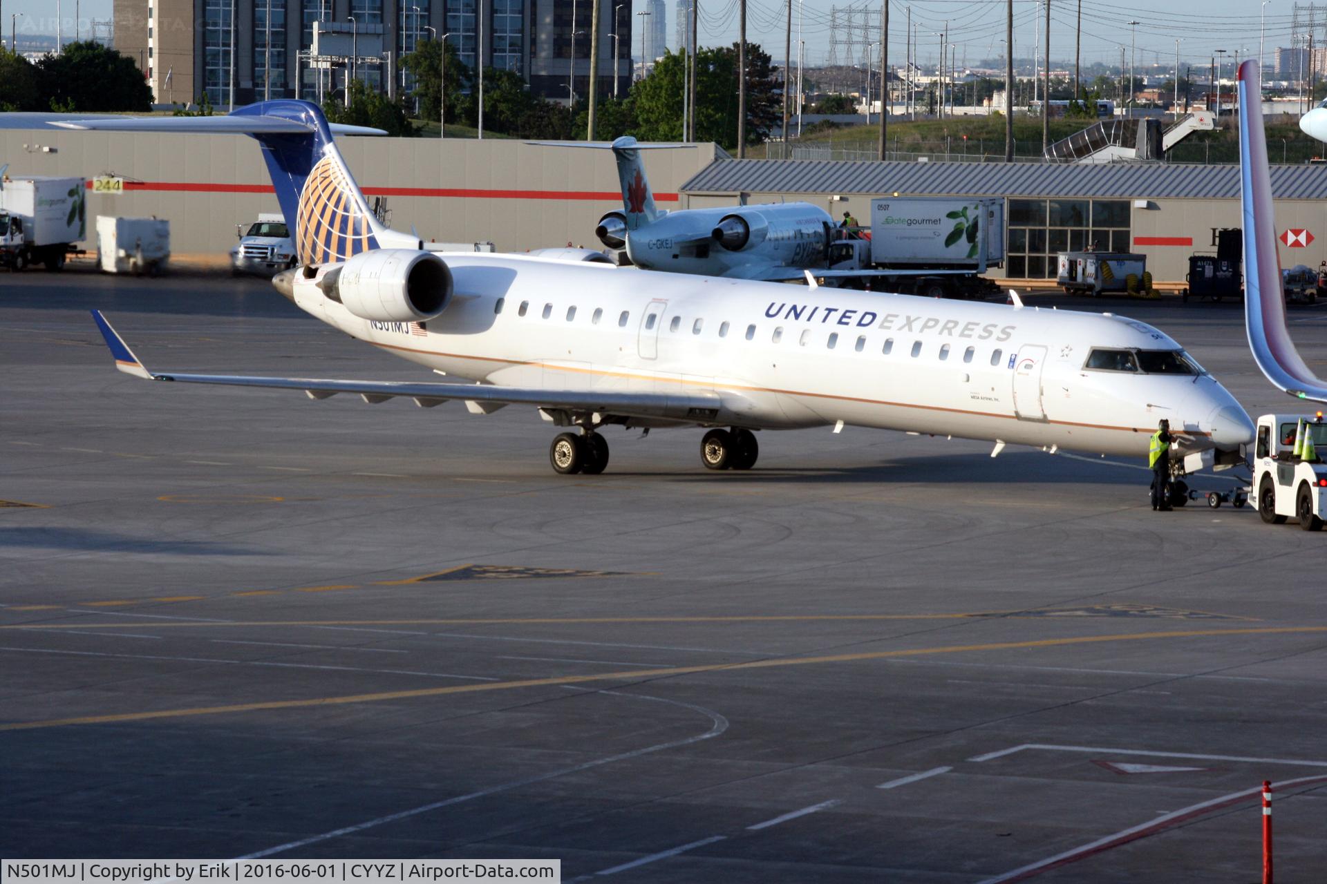 N501MJ, 2002 Canadair CL-600-2C10 Regional Jet CRJ-700 C/N 10047, N501MJ in YYZ