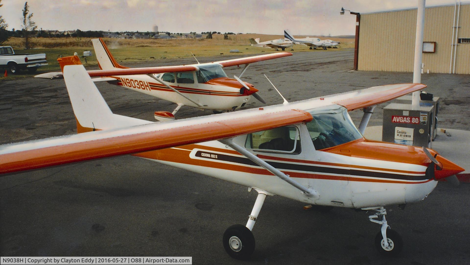 N9038H, 1975 Cessna 172M C/N 17265912, Cessna 9038H, background, parked on the ramp at the old Rio Vista Airport in California.