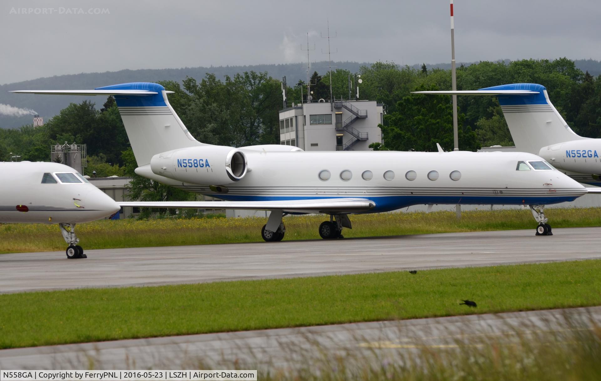 N558GA, Gulfstream Aerospace GV-SP (G550) C/N 5258, Amgen G5SP with sister ship parked next to it.