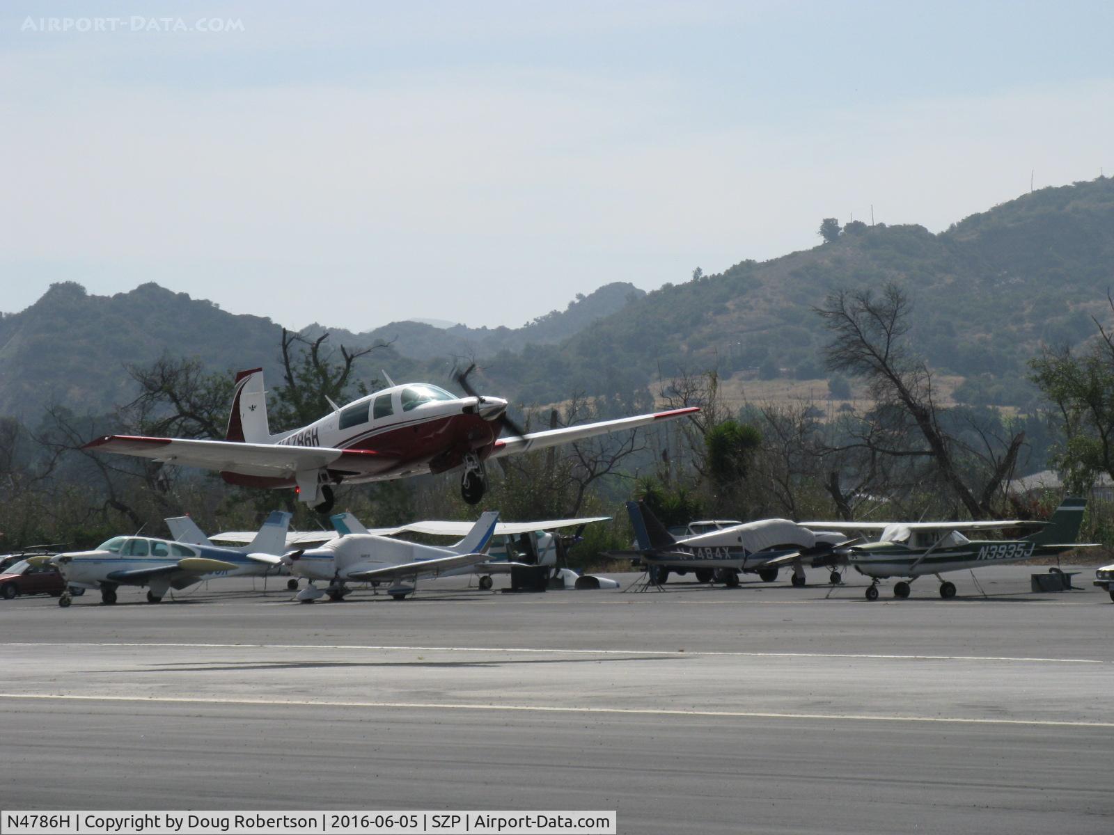 N4786H, 1979 Mooney M20J 201 C/N 24-0876, 1979 Mooney M20J 201, Lycoming IO-360 A&C 200 Hp, takeoff climb Rwy 22