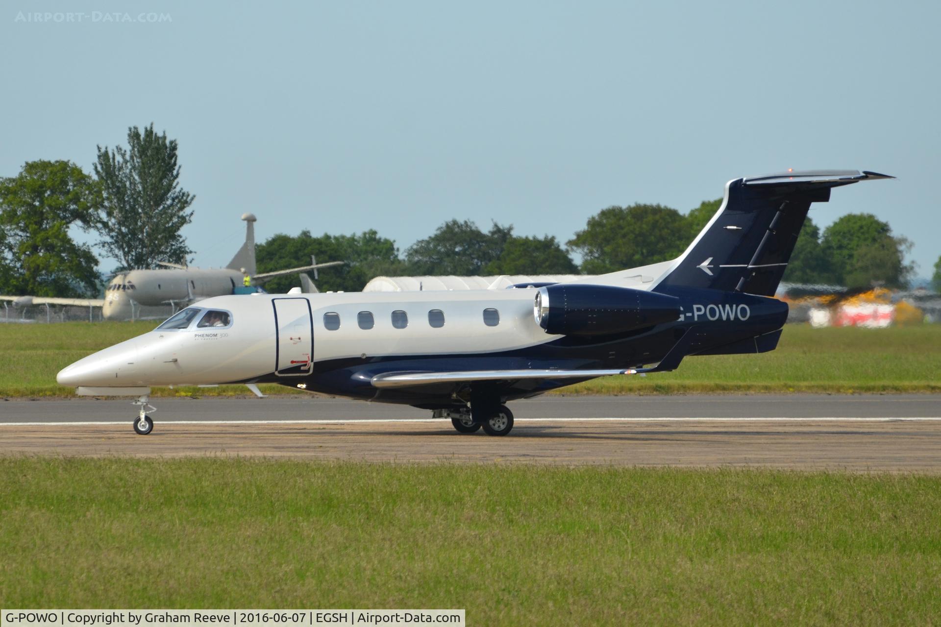 G-POWO, 2015 Embraer EMB-505 Phenom 300 C/N 50500266, About to depart from Norwich.