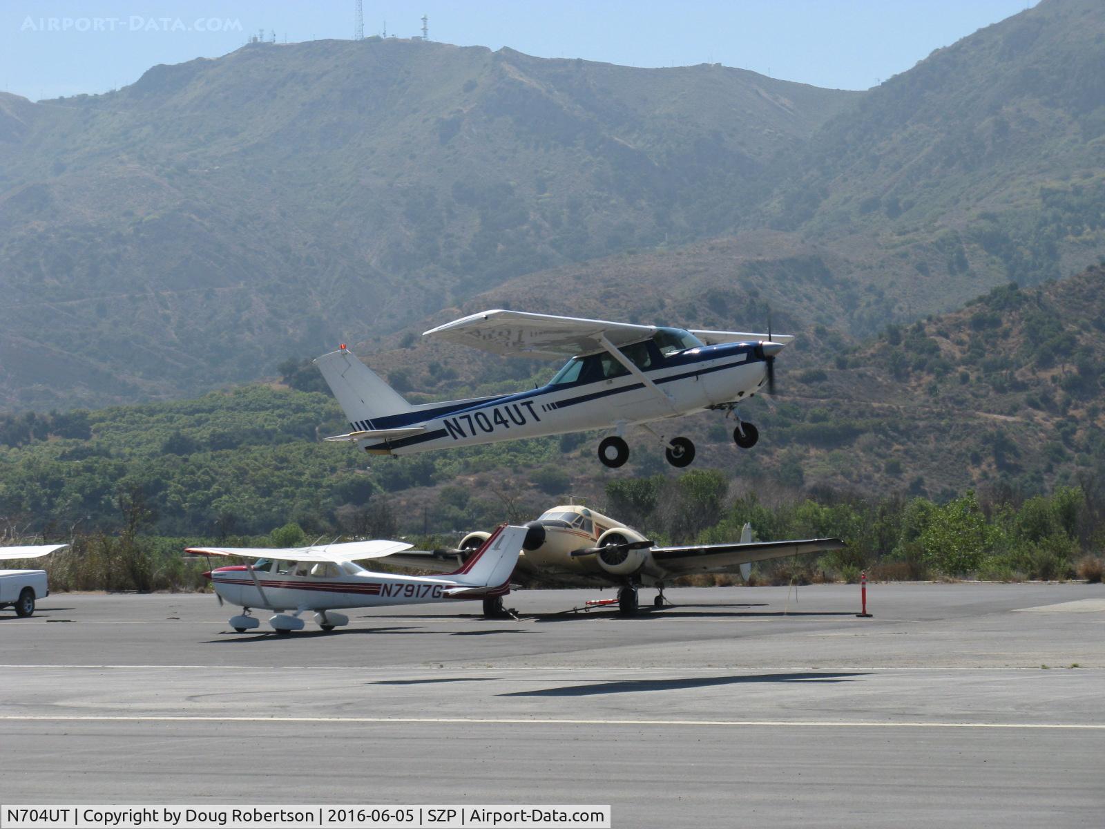 N704UT, 1976 Cessna 150M C/N 15078891, 1976 Cessna 150M, Continental O-200 100 Hp, takeoff climb Rwy 22