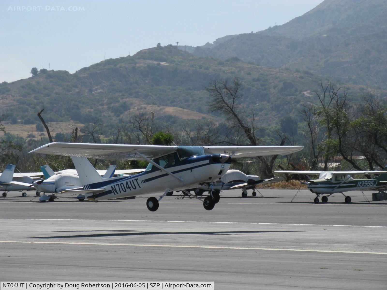 N704UT, 1976 Cessna 150M C/N 15078891, 1976 Cessna 150M, Continental O-200 100 Hp, takeoff climb Rwy 22