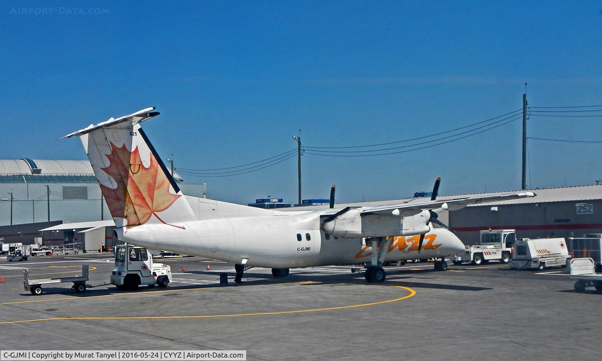 C-GJMI, 1987 De Havilland Canada DHC-8-102 Dash 8 C/N 077, At gate at Toronto Pearson International