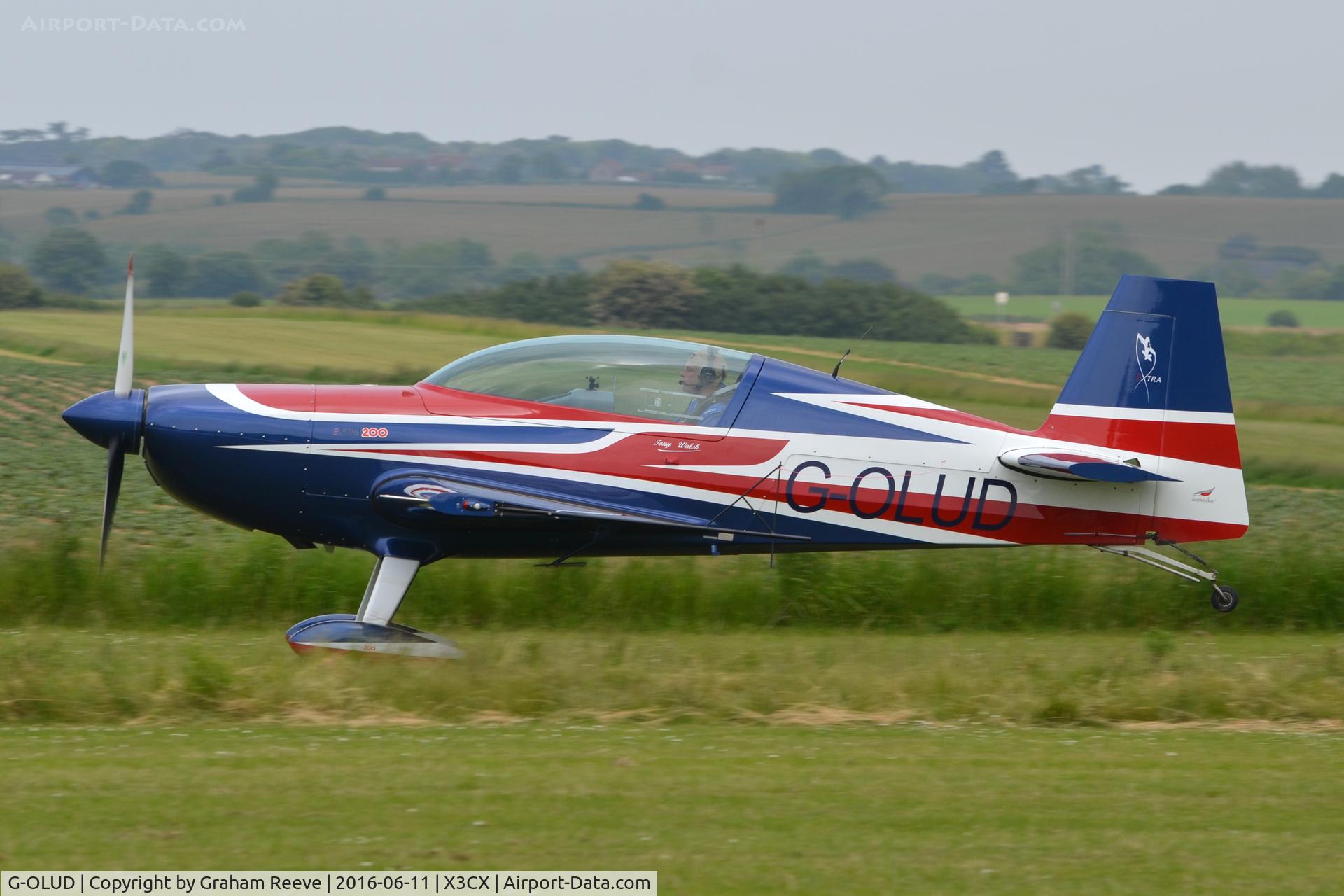 G-OLUD, 2012 Extra EA-300 C/N 1044, Departing from Northrepps.