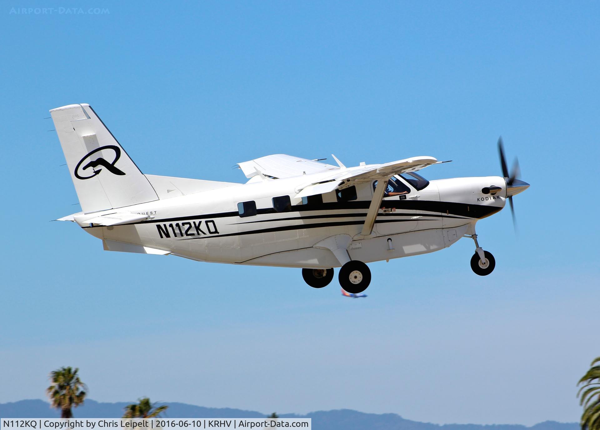 N112KQ, 2014 Quest Kodiak 100 C/N 100-0112, TWA Aviation LLC (Mill Valley, CA) 2014 Quest Kodiak departing over some SJC traffic at Reid Hillview Airport, San Jose, CA. Appears to be rolling over the 737 inbound to San Jose Intl Airport!