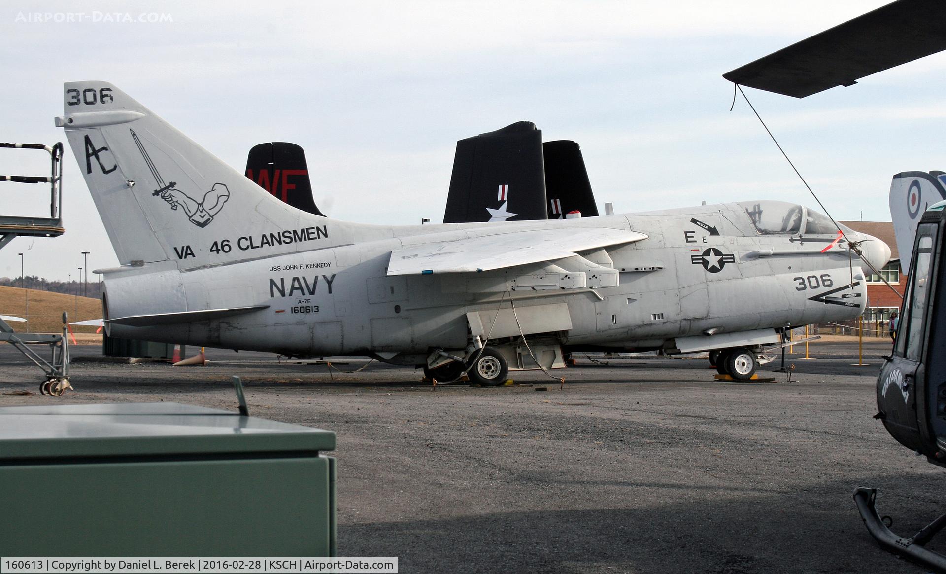 160613, LTV A-7E Corsair II C/N E-482, This Corsair is on display at the Empire State Aerosciences Museum, framed by a Huey and other items.
