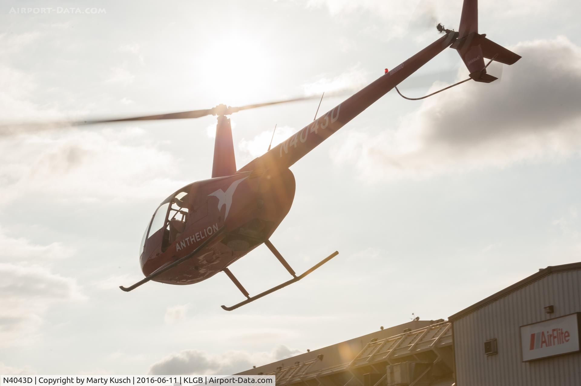 N4043D, Robinson R44 C/N 0814, Departing to the West.