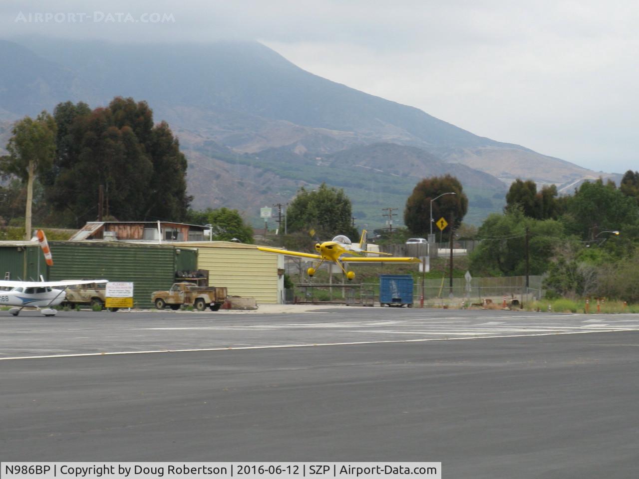 N986BP, 2013 Vans RV-4 C/N 4107, 2013 Stewart VAN's RV-4 'Banana Puddin', Lycoming O-320-D1A 160 Hp, on final Rwy 22-doing pattern work today