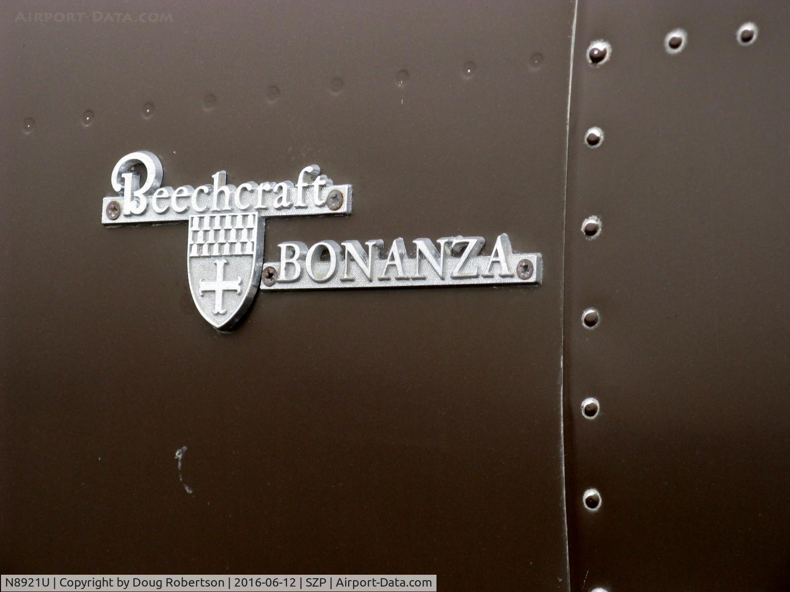 N8921U, 1965 Beech S35 Bonanza C/N D-7911, 1965 Beech S35 BONANZA, Continental IO-520-B 285 Hp, logo