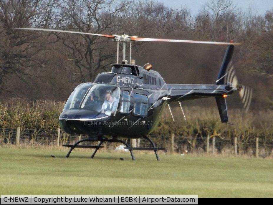 G-NEWZ, 1998 Bell 206B JetRanger III C/N 4475, Preparing to depart from Sywell Aerodrome.