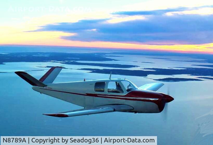 N8789A, 1950 Beech B35 C/N D-2211, In formation over Long Island Sound