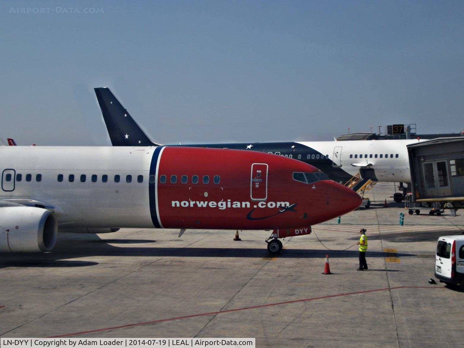 LN-DYY, 2012 Boeing 737-8JP C/N 39012, LN-DYY at Alicante with a Titan Airways 757 in the background