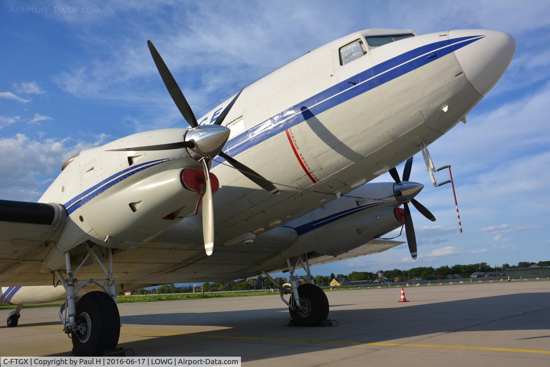 C-FTGX, 1944 Douglas Basler BT67 (DC-3TP) C/N 25769, Bell Geospace DC-3C emlightened by the evening sun at LOWG, Graz