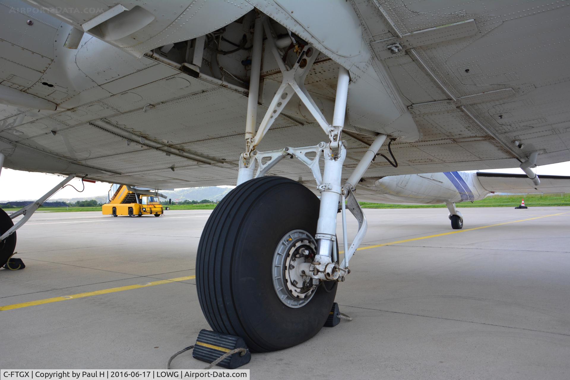 C-FTGX, 1944 Douglas Basler BT67 (DC-3TP) C/N 25769, Main landing gear of a 72 year old DC-3, making a night-stop at LOWG, Graz