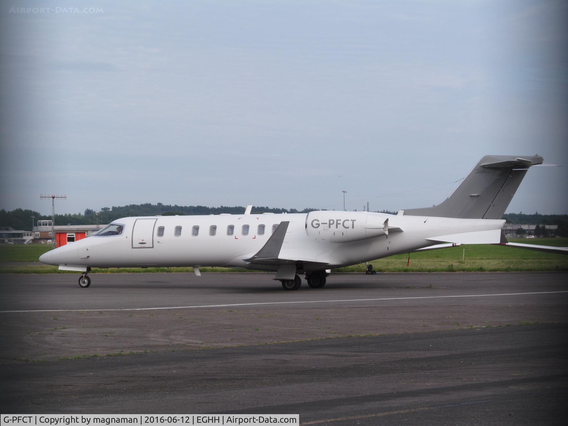 G-PFCT, 1999 Learjet 45 C/N 45-055, at hurn in drizzle