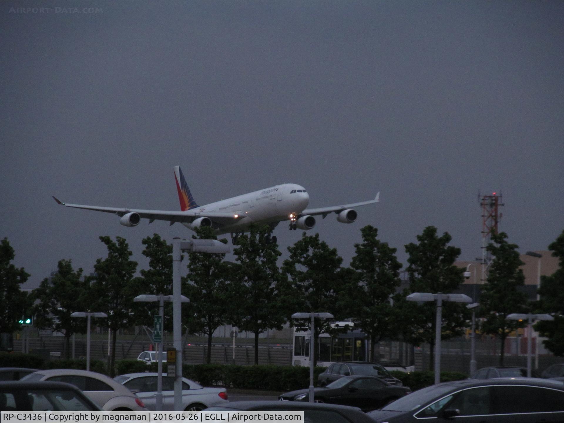 RP-C3436, 2000 Airbus A340-313 C/N 318, on finals at LHR on gloomy evening