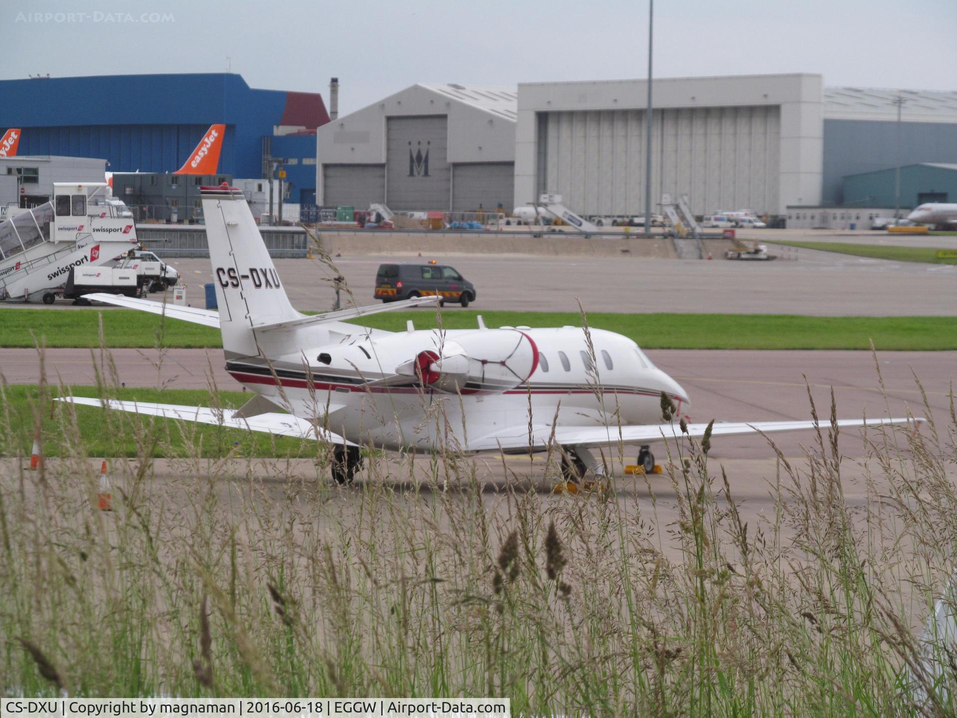 CS-DXU, 2008 Cessna 560 Citation Excel C/N 560-5775, on apron by long term car park