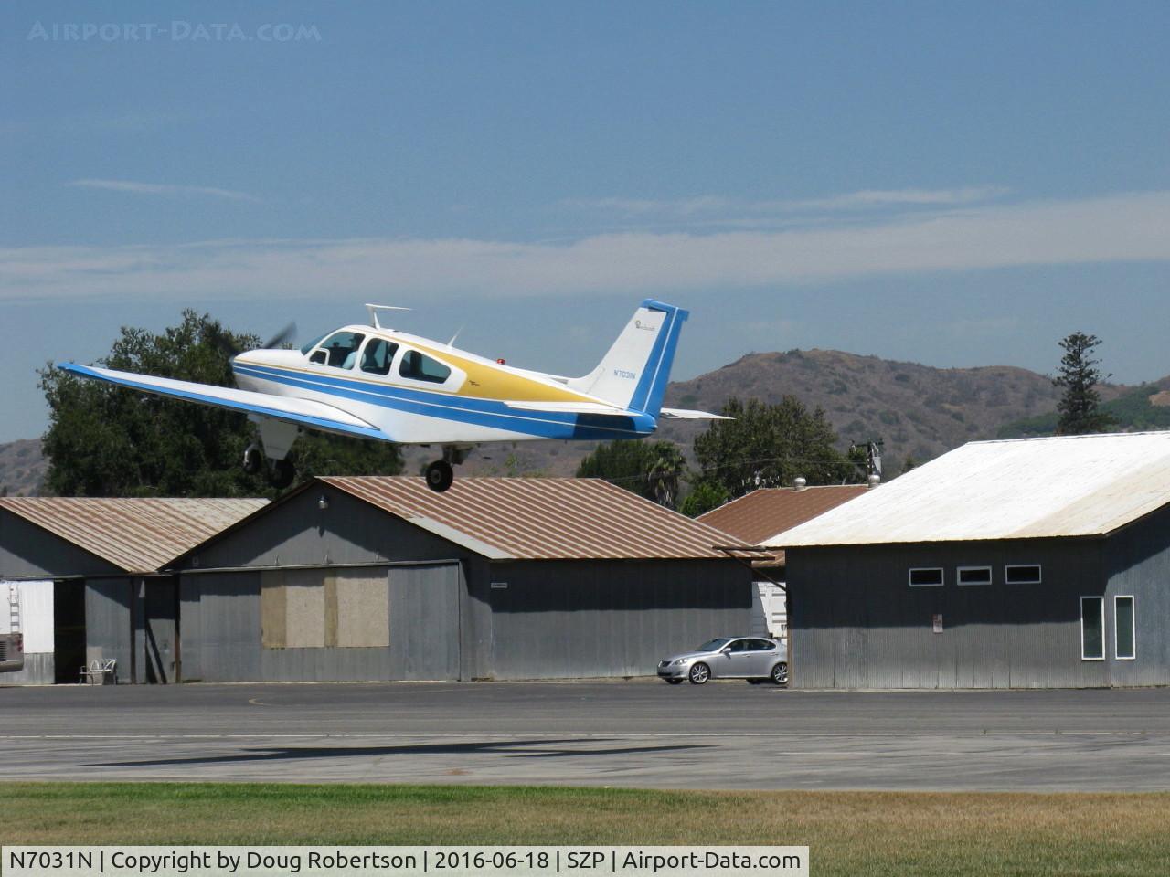 N7031N, 1967 Beech E33 Bonanza C/N CD-1125, 1967 Beech E33 BONANZA, Continental IO-470 225 Hp, takeoff climb Rwy 22