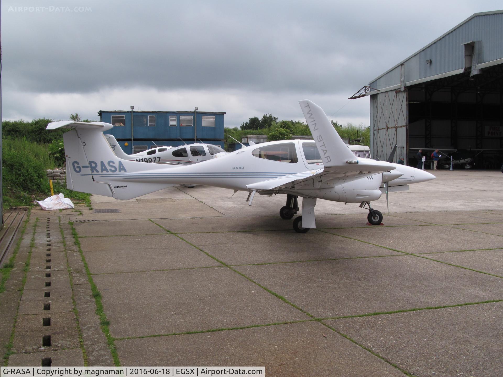 G-RASA, 2006 Diamond DA-42 Twin Star C/N 42.144, outside hangar