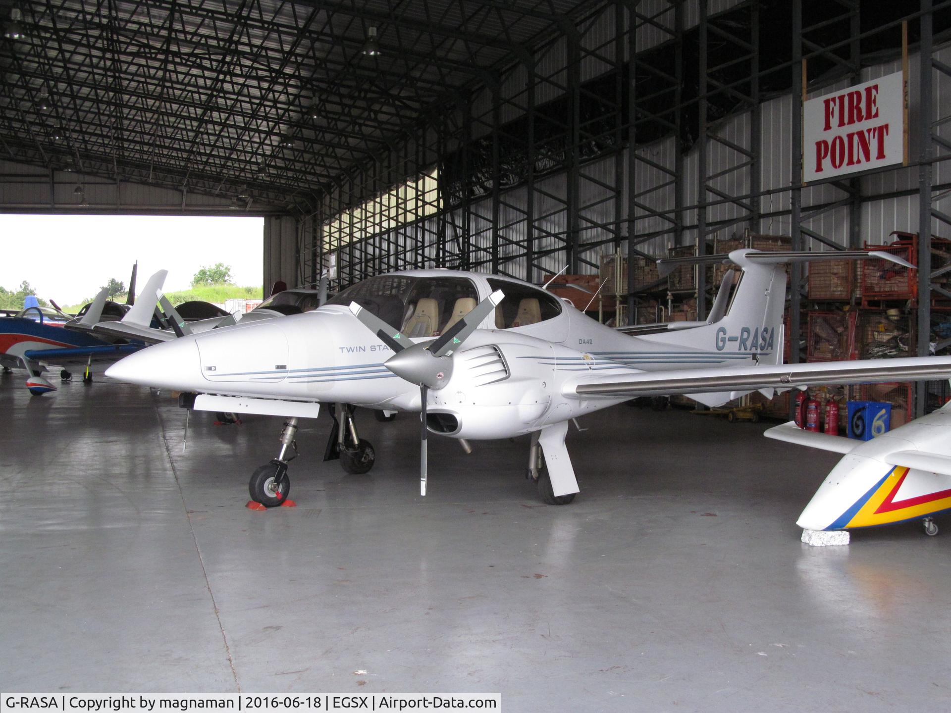 G-RASA, 2006 Diamond DA-42 Twin Star C/N 42.144, in home hangar