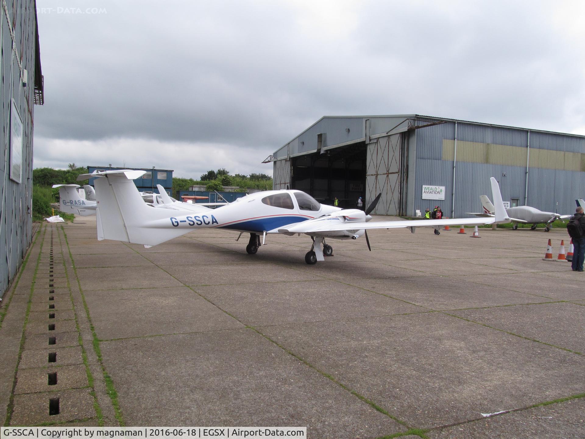 G-SSCA, 2014 Diamond DA-42NG Twin Star C/N 42.N138, outside hangar at NW