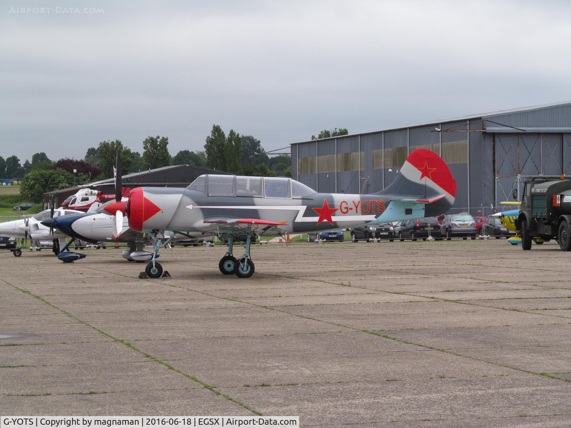 G-YOTS, 1990 Bacau Yak-52 C/N 9010308, yachts perhaps?