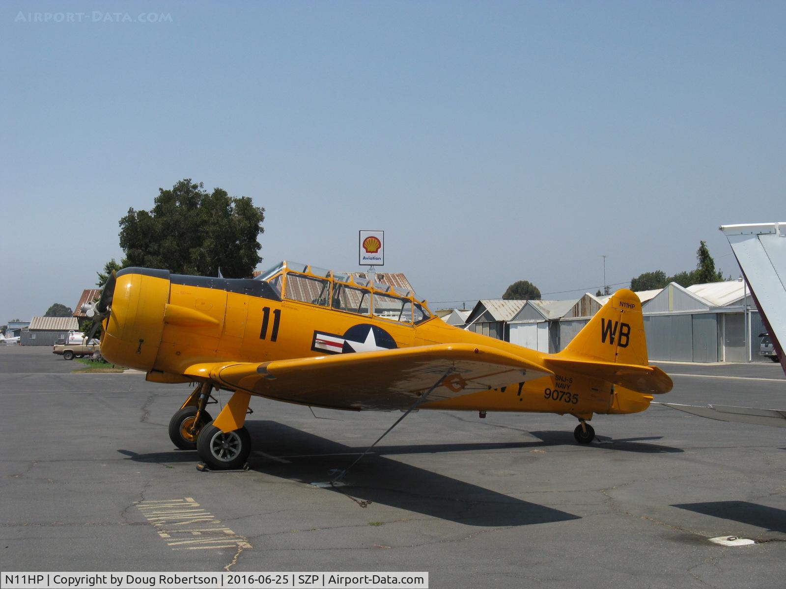 N11HP, 1943 North American SNJ-5 Texan Texan C/N 90735, 1943 North American SNJ-5, Pratt & Whitney R-1340-AN-1 WASP 550 Hp radial, in standard US Naval Aviation trainer configuration, markings, coloration.  FAA Std. registration. Excellent, pristine example.
